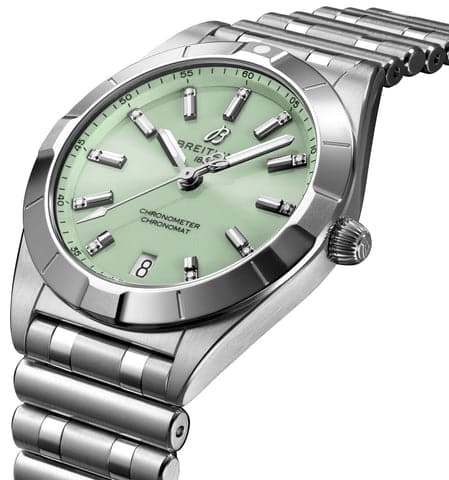 Breitling Chronomat 32 Ladies A77310101L1A1 with mint green dial, steel case, and Rouleaux bracelet.